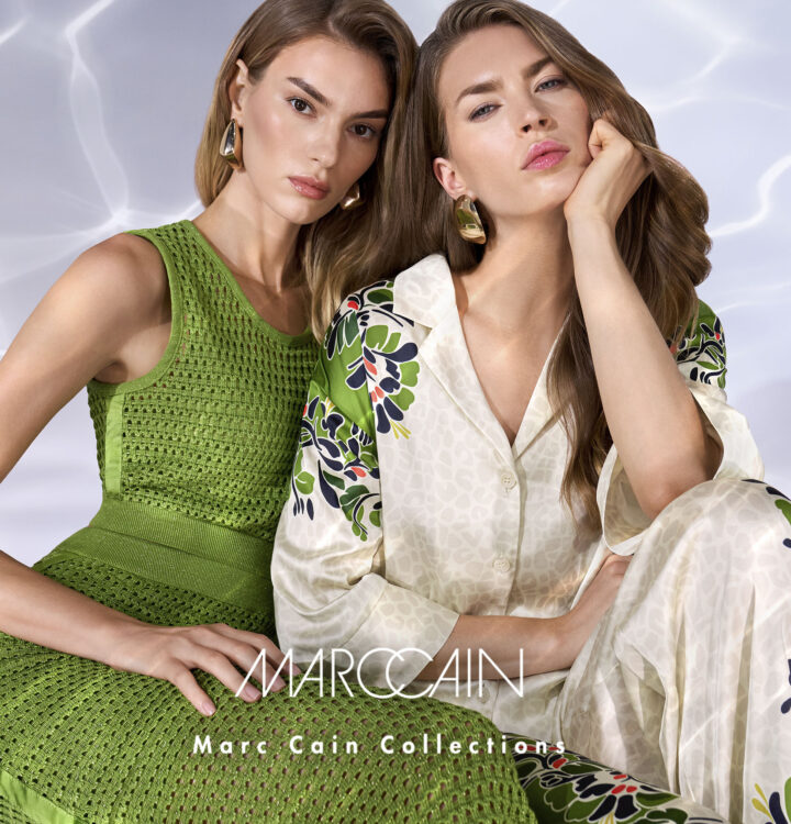 2 Models mit einem grünen Kleid und einem beigen Anzug von Marc Cain für den Frühling 2026